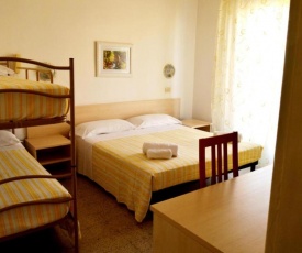 Room in Guest room - New Hotel Cirene Big Quadruple Room 4 people half pension package